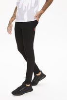 Front view of 11 Degrees black stretch skinny jeans
