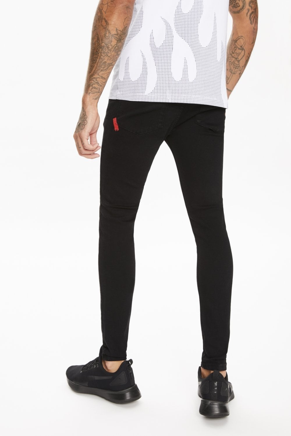 Back view of 11 Degrees black stretch skinny jeans