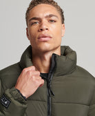 SUPERDRY Sports Puffer Non hooded Jacket Football Grid Khaki Football Grid Khaki model front view