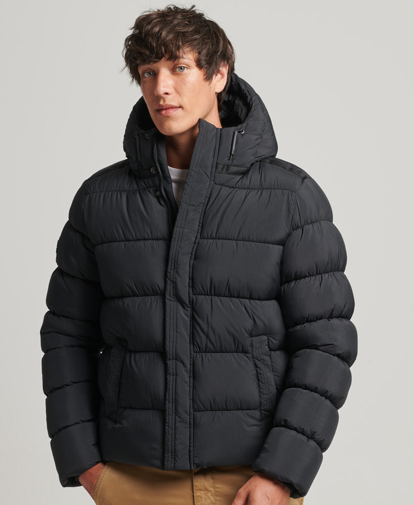 SUPERDRY Black XP-D Sports Puffer Jacket Black front view