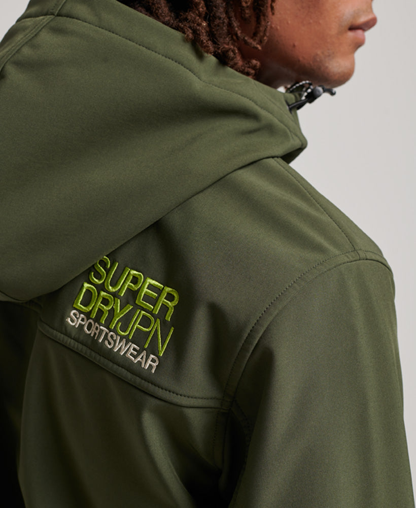 Men's Code Trekker Jacket Dark Moss-Close Up of Logo View