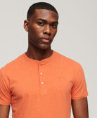 SUPERDRY Vintage Logo Emb Short Sleeve Henley Fire Orange Marl Fire Orange Marl model front view
